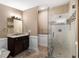 Modern bathroom featuring a large walk-in shower and granite vanity at 116 Southside Dr, Villa Rica, GA 30180