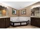 Elegant bathroom with soaking tub, double vanity, and tile shower at 116 Southside Dr, Villa Rica, GA 30180