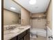 Clean bathroom with a shower/tub combo and granite countertop at 116 Southside Dr, Villa Rica, GA 30180