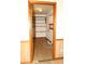Laundry area with wood shelving and vinyl flooring at 3219 Boulder Brook Dr, Lithonia, GA 30038