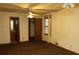 Main bedroom with carpet, ceiling fan, and access to a bathroom and closet at 3219 Boulder Brook Dr, Lithonia, GA 30038