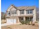 Two-story house with brick and siding exterior at 188 Sophie Cir, Locust Grove, GA 30248