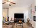 Spacious living room with a large TV, fireplace, and comfortable seating at 188 Sophie Cir, Locust Grove, GA 30248