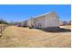 Large backyard with a wooden fence and a playset at 188 Sophie Cir, Locust Grove, GA 30248