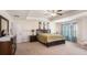 Spacious Primary suite with large bed, ample closet space, and neutral decor at 188 Sophie Cir, Locust Grove, GA 30248