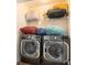 Laundry closet with LG washer and dryer and shelving at 188 Sophie Cir, Locust Grove, GA 30248