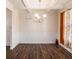 Formal dining room with hardwood floors and wainscoting at 188 Sophie Cir, Locust Grove, GA 30248