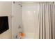 Bathroom with white subway tile and shower/tub combo at 1166 Booth Sw Rd # 402, Marietta, GA 30008