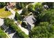 Aerial view of a house with a large backyard and driveway at 1210 Lancelot Ct, Loganville, GA 30052