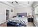 Large main bedroom with a king-size bed and en-suite bathroom at 421 Bedford Xing, Mcdonough, GA 30253