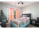 Bright bedroom with a double bed and plenty of natural light at 421 Bedford Xing, Mcdonough, GA 30253