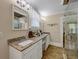 Bathroom with a double vanity and large walk-in shower at 133 Hillside Se Ave, Atlanta, GA 30315