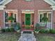 Brick house with green door and porch at 133 Hillside Se Ave, Atlanta, GA 30315