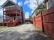 Private back alley access with a shared driveway and wooden fence at 3186 Dogwood Dr, Atlanta, GA 30354