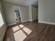 Bedroom with hardwood floors and access to bathroom at 3186 Dogwood Dr, Atlanta, GA 30354