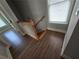 Wood staircase with white railing and hardwood floors at 3186 Dogwood Dr, Atlanta, GA 30354