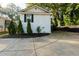 White brick home with black shutters and a driveway at 2911 Glenwood Se Ave, Atlanta, GA 30317