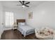 Cozy bedroom with ceiling fan and hardwood floors at 645 Cumberland Ne Rd, Atlanta, GA 30306