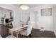 Bright dining room featuring a glass table and elegant chandelier at 645 Cumberland Ne Rd, Atlanta, GA 30306