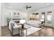 Living room with white furniture, fireplace, rug, and French doors at 262 Green Hill Rd, Sandy Springs, GA 30342