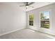 Bedroom with carpet, windows, and a ceiling fan at 1129 Rivard Nw Cir, Atlanta, GA 30318