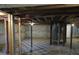 Unfinished basement with checkerboard flooring at 973 Neal Nw St, Atlanta, GA 30314