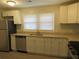 Kitchen with white cabinets, granite countertops, and stainless steel appliances at 973 Neal Nw St, Atlanta, GA 30314