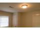 Spacious bedroom with door and window at 973 Neal Nw St, Atlanta, GA 30314
