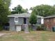 Gray exterior, 2-bedroom home with a small yard and walkway at 973 Neal Nw St, Atlanta, GA 30314