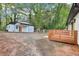 Backyard view of the house with a detached structure and wooden deck at 2910 3Rd Sw Ave, Atlanta, GA 30315