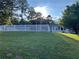 Backyard with a gazebo and a white fence at 1078 Highway 92 S, Fayetteville, GA 30215