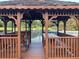 Relaxing lakeside gazebo with seating and table at 1078 Highway 92 S, Fayetteville, GA 30215