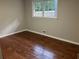 Spacious bedroom with hardwood floors and large window at 1078 Highway 92 S, Fayetteville, GA 30215