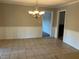 Bright dining room with tile flooring and chandelier at 1078 Highway 92 S, Fayetteville, GA 30215