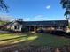 Brick ranch house with a large yard and mature trees at 1078 Highway 92 S, Fayetteville, GA 30215