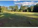Expansive grassy yard with a line of trees at 1078 Highway 92 S, Fayetteville, GA 30215