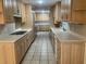 Large kitchen with ample cabinetry and tile floor at 1078 Highway 92 S, Fayetteville, GA 30215