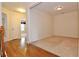 Upper hallway with hardwood floors and access to bedroom and bonus room at 1957 Brightleaf Way # 59, Marietta, GA 30060