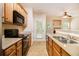 Kitchen features granite countertops, wood cabinets, and a back door at 2836 Ridgeview Dr, Atlanta, GA 30331