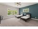 Bedroom with two twin beds and a teal accent wall at 435 Webb Dr, Norcross, GA 30071