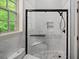 Modern bathroom with a large walk-in shower at 625 Brandenburgh Way, Roswell, GA 30075