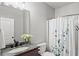 Clean bathroom featuring granite vanity and shower at 625 Brandenburgh Way, Roswell, GA 30075