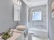 Clean bathroom with bathtub and updated vanity at 2408 Hillcrest Dr, East Point, GA 30344