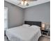 Spacious bedroom with a king-size bed and ceiling fan at 2408 Hillcrest Dr, East Point, GA 30344