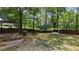 Private backyard with patio and swing at 2198 Indian Shoals Dr, Loganville, GA 30052