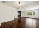 Spacious living room featuring hardwood floors and a modern fireplace at 2870 Long Way, Decatur, GA 30032