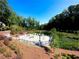 Community gazebo and pond with walking trails at 265 Briscoe Way # 4, Alpharetta, GA 30009