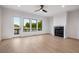 Bright living room with hardwood floors and a fireplace at 3074 Kelly St, Scottdale, GA 30079