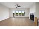 Bright living room with hardwood floors and a fireplace at 3074 Kelly St, Scottdale, GA 30079