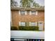 Brick townhouse exterior with landscaping at 6354 Shannon Pkwy # 12F, Union City, GA 30291